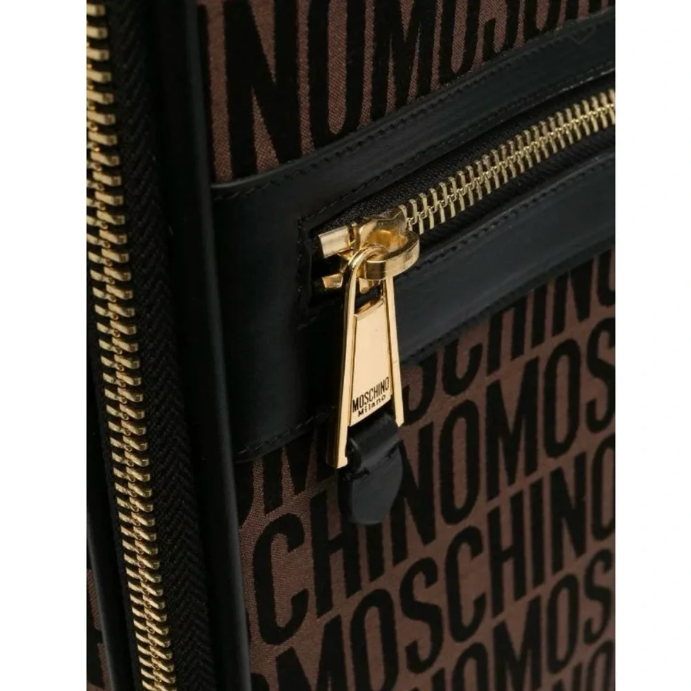 MOSCHINO MONOGRAM-PATTERN LEATHER SUITCASE Authentic,Calf Leather. Nice luggage